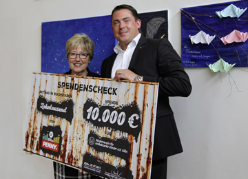 PENNY spendet 10.000 Euro für krebskranke Kinder in Köln