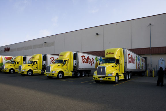 distribution center outside raley's semi trucks news vans